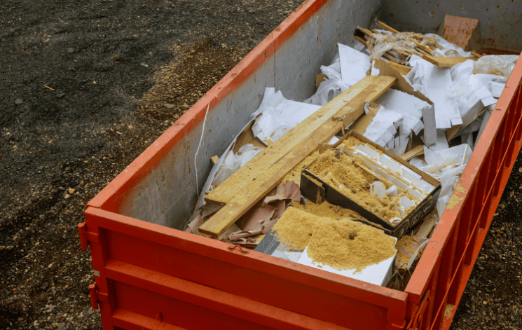 Truck bed filled with residential junk ready for haul-away