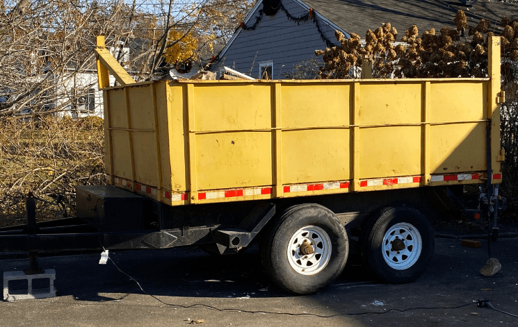 Junk removal trailer packed and ready for transport